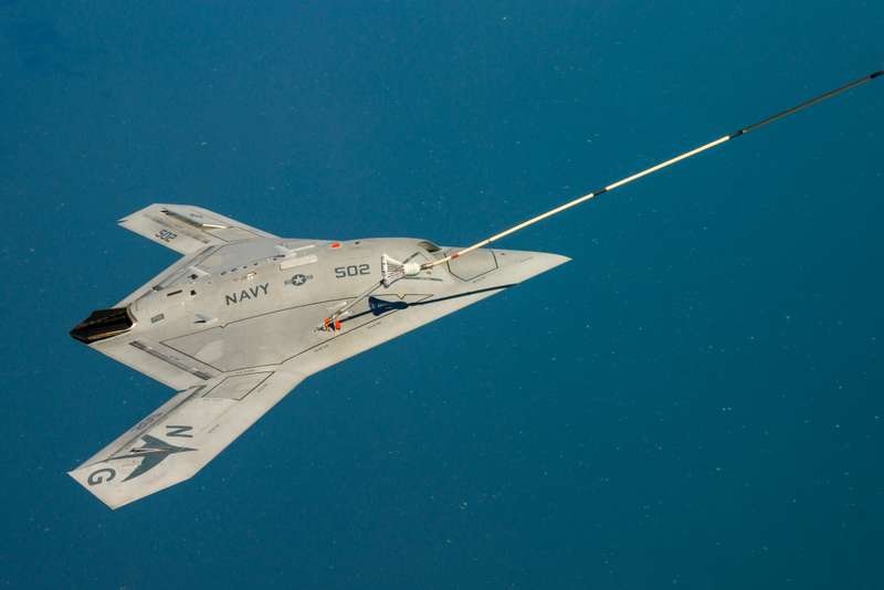 Illustration for article titled Bask In The Awesome Of The Bat-Winged X-47B Sipping Gas From A Tanker